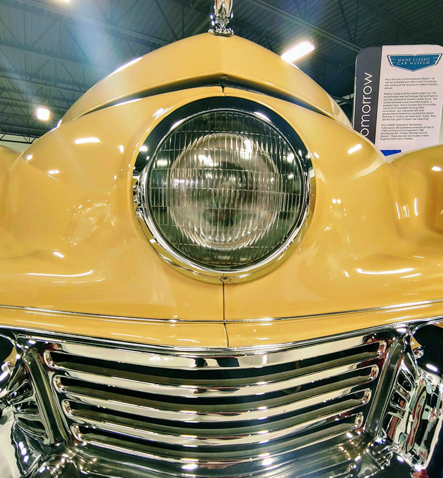 Yellow antique auto Tucker